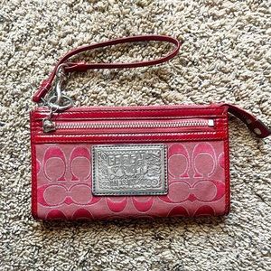 Dark red Coach wristlet wallet